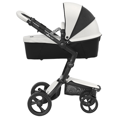 Carucior 2in1 mima Xari New York Zebra cu cadru Black, in configuratia landou.lateral.